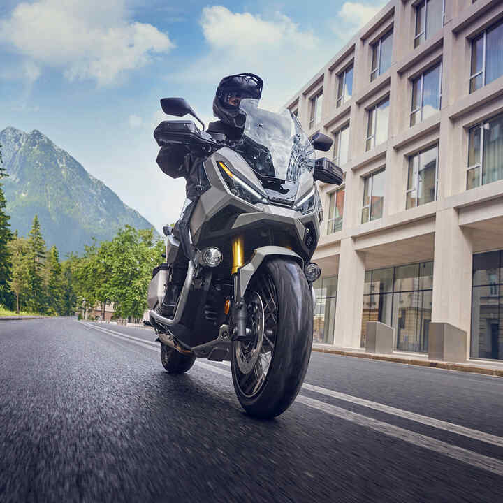 2025 X-ADV with mountain and building